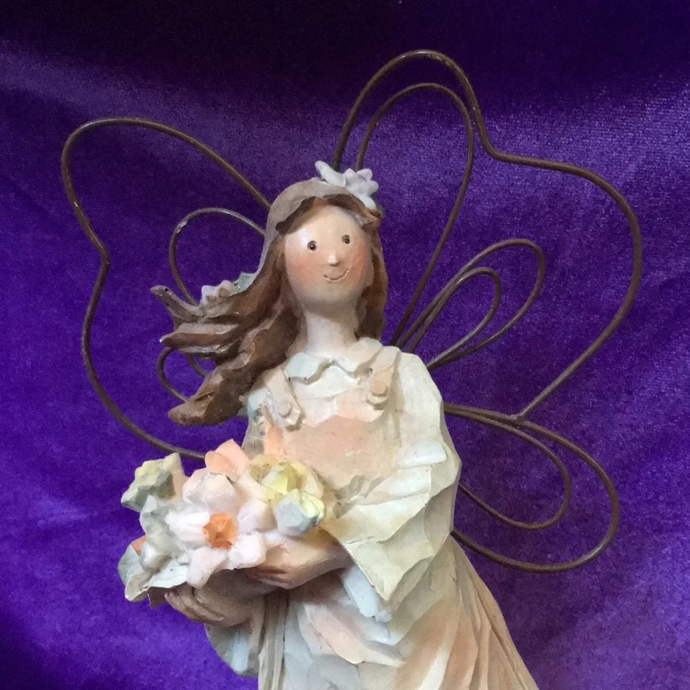 Resin Angel Holding Basket of Flowers